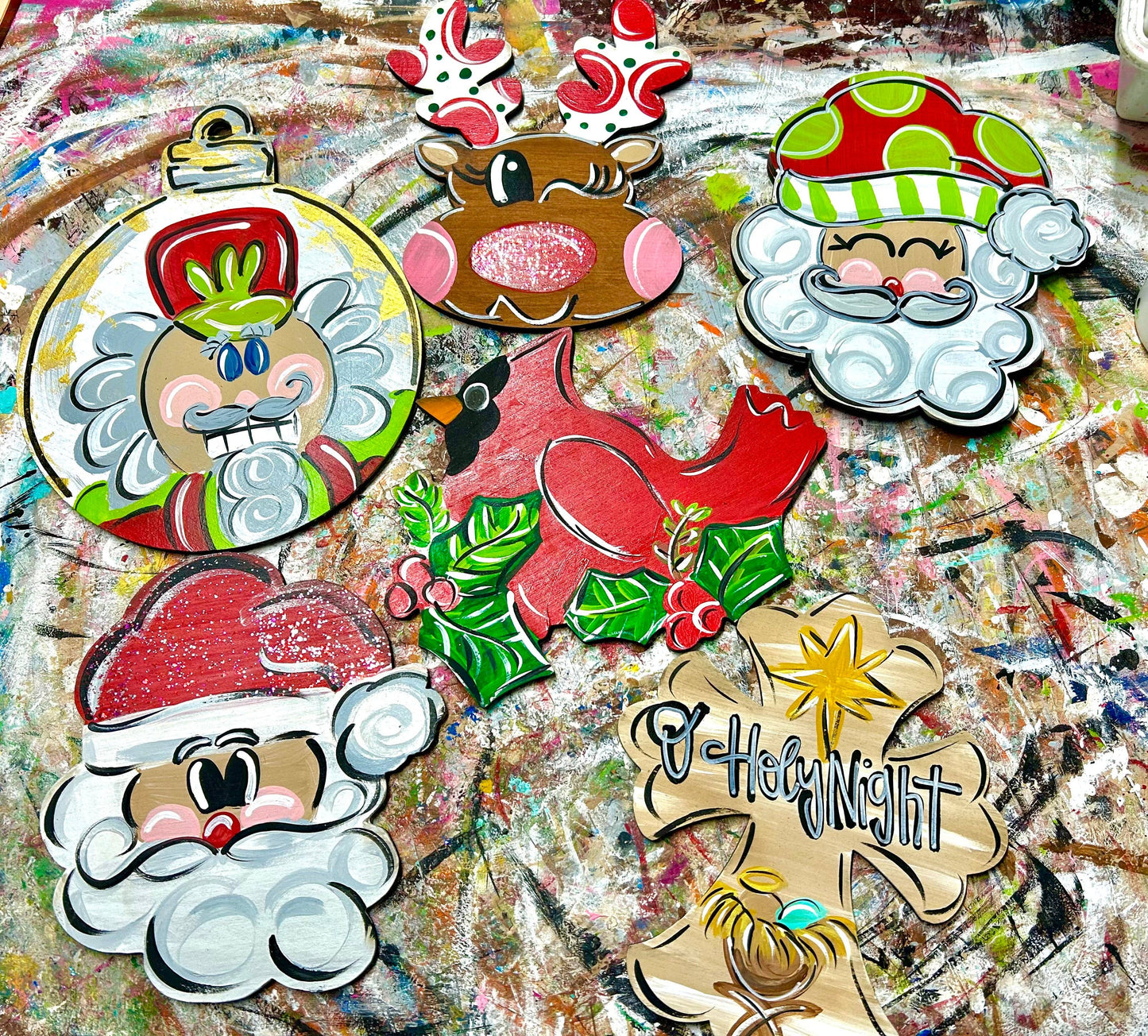 Variety Christmas ornaments, hand painted, 5”: Tan cross O Holy Nigjt