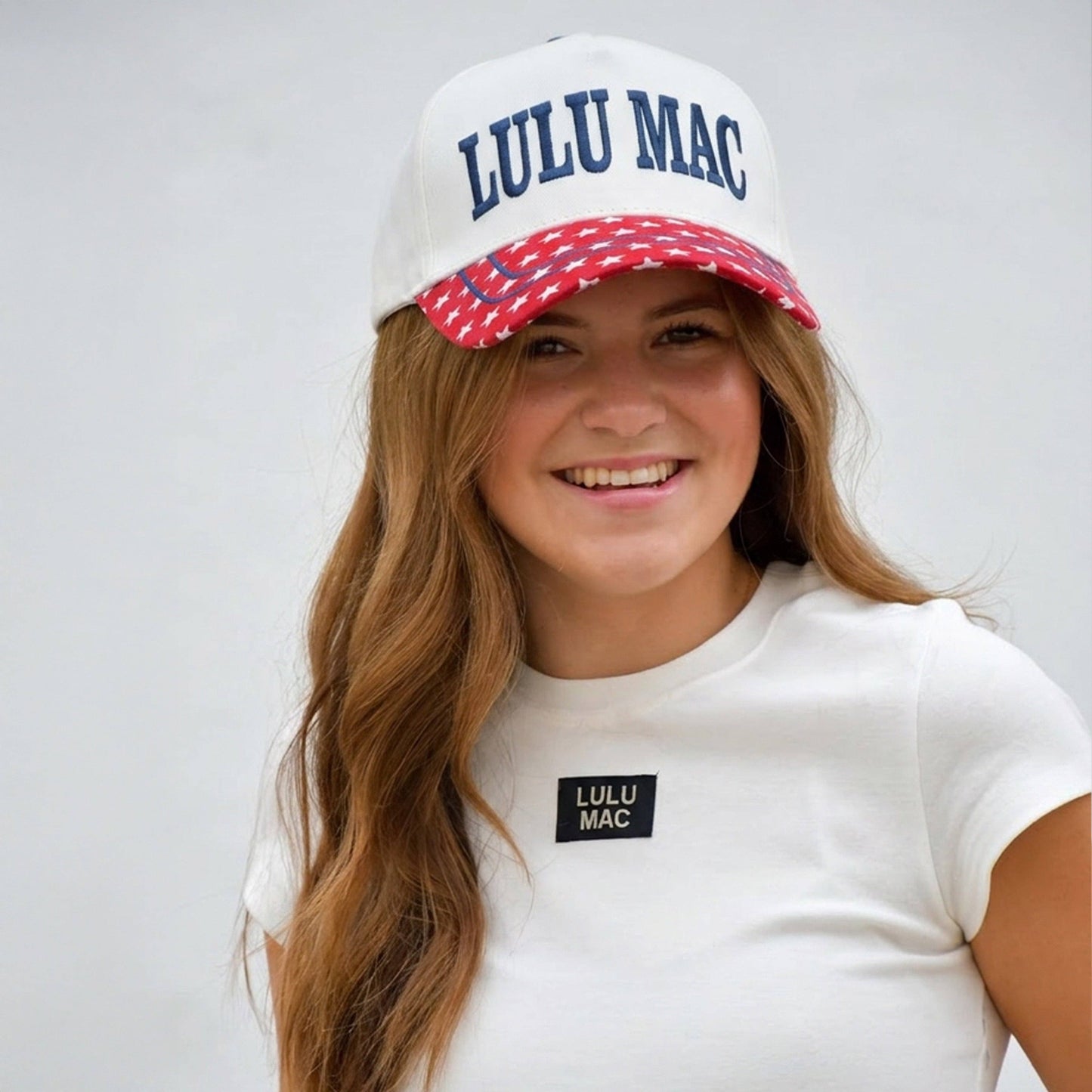 LM-NAVY STITCH/RED BILL